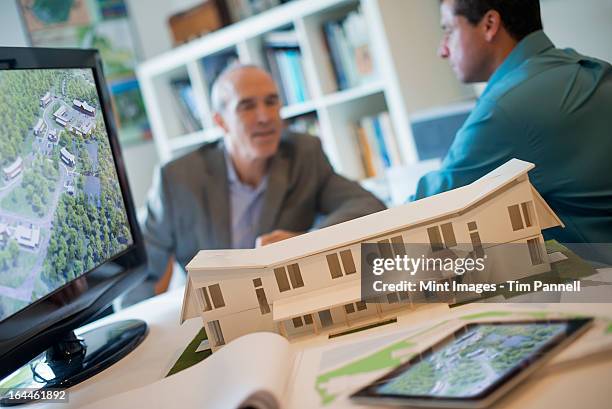 Architects Using Computer Laptop Angled Mockup Photos and Premium High Res Pictures - Getty Images