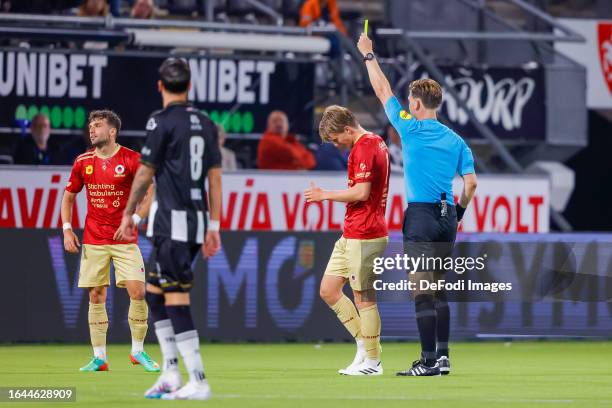 Lazaros Lamprou of SBV Excelsior gets his second yellow card from referee Joey Kooij during the Dutch Eredivisie match between Heracles Almelo and...