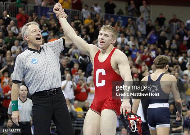 Des Moines, IAKyle Dake of the Cornell Big Red celebrates his victory over David Taylor of the Penn State Nittany Lions in the 165-pound championship...
