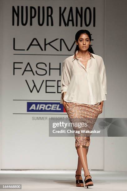 Model showcases designs by Nupur Kanoi on the runway during day two of the Lakme Fashion Week Summer/Resort 2013 on March 23, 2013 at Grand Hyatt in...