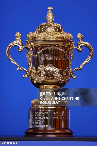This photograph taken on September 4, 2023 shows the Rugby Union World Cup trophy, the Webb Ellis Cup, presented during the tournament opening...