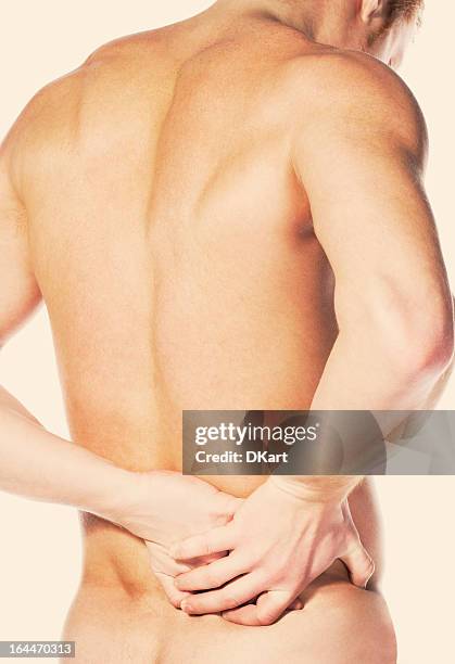 pain in a waist - male buttocks stockfoto's en -beelden
