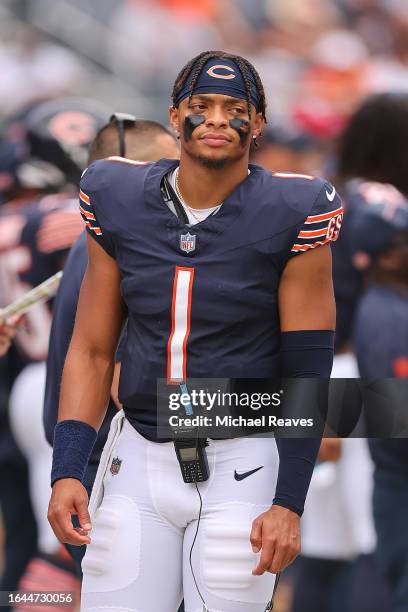 Justin Fields of the Chicago Bears looks on against the Buffalo Bills during the first half of a preseason game at Soldier Field on August 26, 2023...