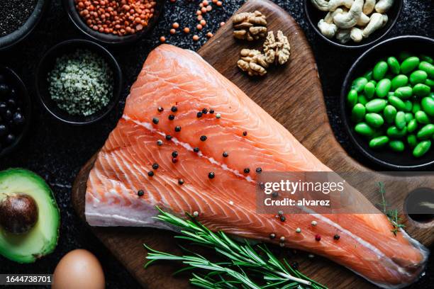 top view of omega 3 rich food ingredients on table - cashew pieces stock pictures, royalty-free photos & images
