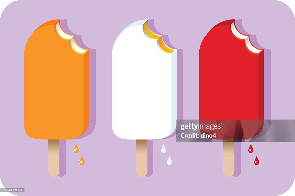 Three different colored bitten into ice cream pops