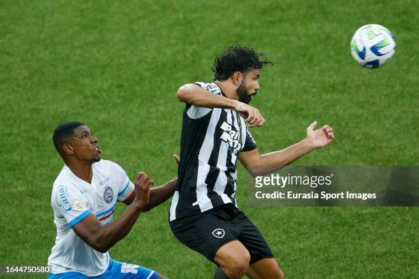 Diego Costa of Botafogo fights for heading the ball with Kanu Soares of Bahia during Campeonato Brasileiro Serie A match between Botafogo and Bahia...