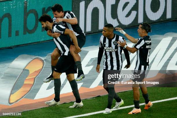 Diego Costa of Botafogo celebrating his goal with his teammate Gabriel Pires and Victor Sá during Campeonato Brasileiro Serie A match between...