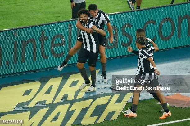 Diego Costa of Botafogo celebrating his goal with his teammate Gabriel Pires during Campeonato Brasileiro Serie A match between Botafogo and Bahia at...