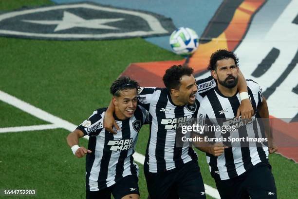 Diego Costa of Botafogo celebrating his goal with his teammate Matías Segovia and Carlos Eduardo during Campeonato Brasileiro Serie A match between...