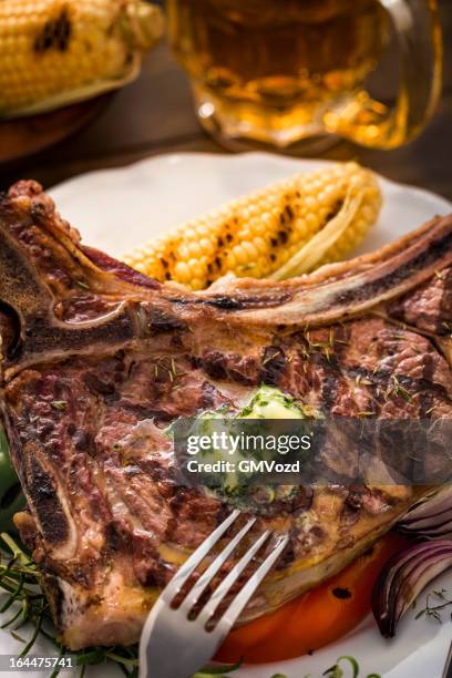 t-bone steak with grilled vegetables - t bone steak stock pictures, royalty-free photos & images