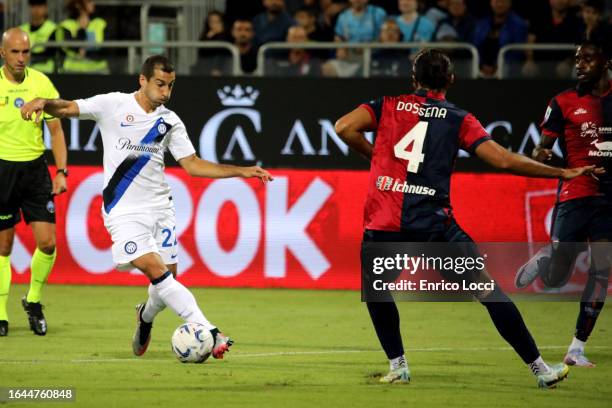 Alberto Dossena of Cagliari in action with Henrikh Mkhitaryan of Inter during the Serie A TIM match between Cagliari Calcio and FC Internazionale at...