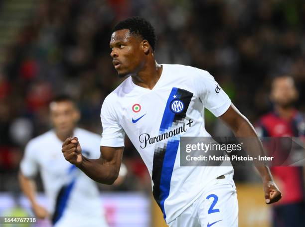 Denzel Dumfries of FC Internazionale celebrates after scoring the goal during the Serie A TIM match between Cagliari Calcio and FC Internazionale at...