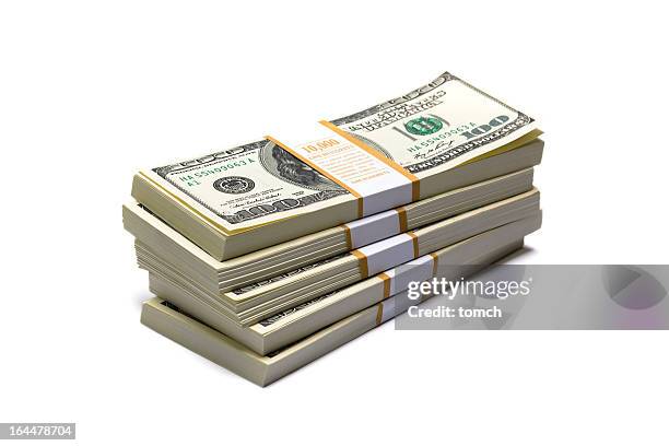 dollars pack on white background - stack stockfoto's en -beelden
