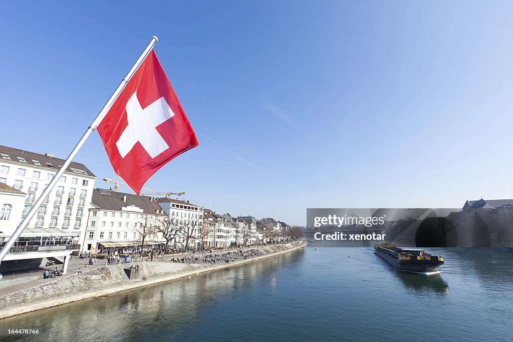 Old City of Basel River Rhine with Swiss Flag