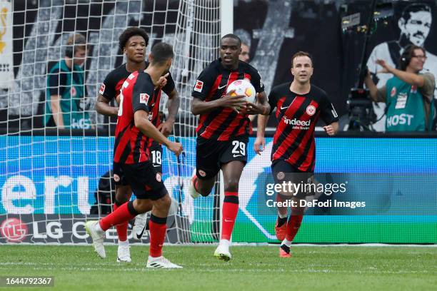 Niels Nkounkou of Eintracht Frankfurt celebrates after his scoring the team's first goal during the Bundesliga match between Eintracht Frankfurt and...