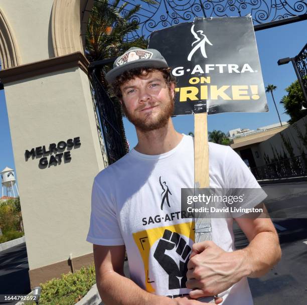 Jack Quaid joins the picket line outside Paramount Studios on August 28, 2023 in Los Angeles, California. Members of SAG-AFTRA and WGA have both...