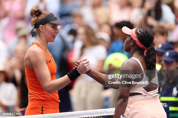 Beatriz Haddad Maia of Brazil shakes hands with Sloane Stephens of the United States after defeating her during their Women's Singles First Round...