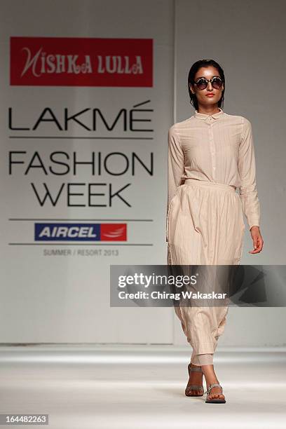 Model showcases designs by Nishka Lulla on the runway during day two of the Lakme Fashion Week Summer/Resort 2013 on March 23, 2013 at Grand Hyatt in...