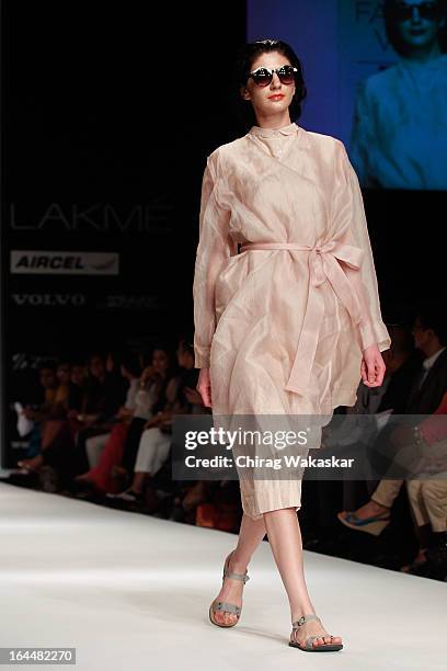 Model showcases designs by Nishka Lulla on the runway during day two of the Lakme Fashion Week Summer/Resort 2013 on March 23, 2013 at Grand Hyatt in...