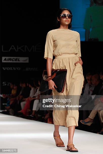 Model showcases designs by Nishka Lulla on the runway during day two of the Lakme Fashion Week Summer/Resort 2013 on March 23, 2013 at Grand Hyatt in...