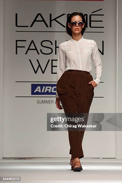 Model showcases designs by Nishka Lulla on the runway during day two of the Lakme Fashion Week Summer/Resort 2013 on March 23, 2013 at Grand Hyatt in...