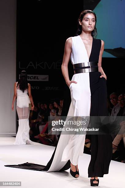 Model showcases designs by Nikhil Thampi on the runway during day two of the Lakme Fashion Week Summer/Resort 2013 on March 23, 2013 at Grand Hyatt...