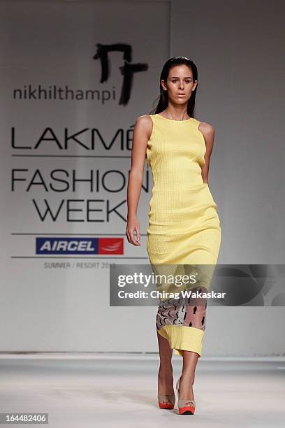 Model showcases designs by Nikhil Thampi on the runway during day two of the Lakme Fashion Week Summer/Resort 2013 on March 23, 2013 at Grand Hyatt...