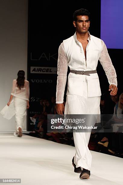 Model showcases designs by Nikhil Thampi on the runway during day two of the Lakme Fashion Week Summer/Resort 2013 on March 23, 2013 at Grand Hyatt...