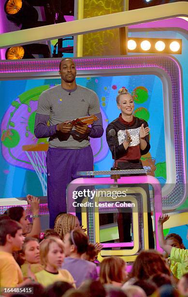 Player Dwight Howard and actress Kaley Cuoco perform during Nickelodeon's 26th Annual Kids' Choice Awards at USC Galen Center on March 23, 2013 in...