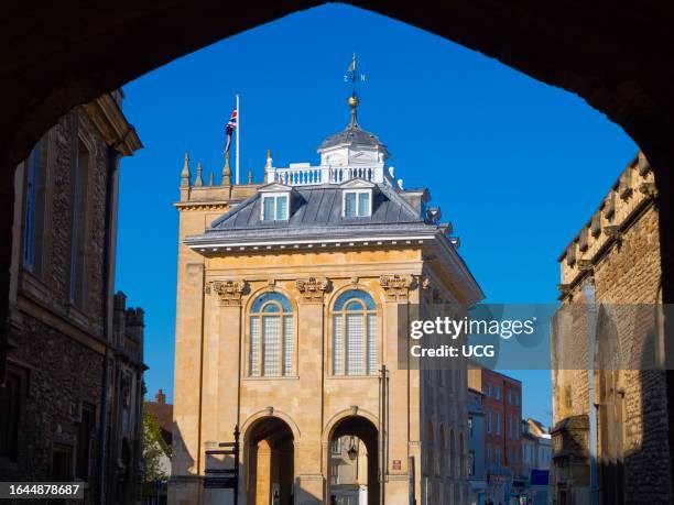 Abingdon Museum seen through gateway of St Nicholas, early spring morning.