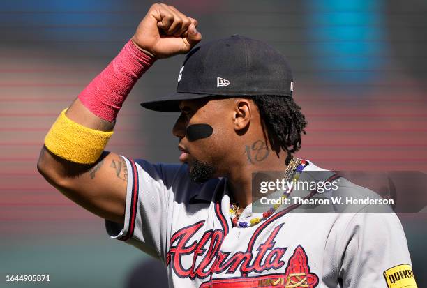 Ronald Acuna Jr. #13 of the Atlanta Braves warms up prior to the start of his game against the San Francisco Giants at Oracle Park on August 27, 2023...