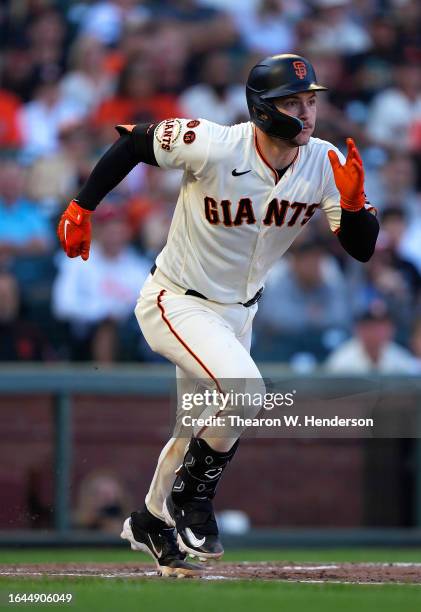Patrick Bailey of the San Francisco Giants hits a bases loaded three-run rbi double against the Atlanta Braves in the bottom of the fifth inning at...