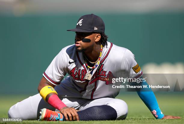 Ronald Acuna Jr. #13 of the Atlanta Braves warms up prior to the start of his game against the San Francisco Giants at Oracle Park on August 27, 2023...