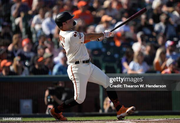 Casey Schmitt of the San Francisco Giants hits a solo home run against the Atlanta Braves in the bottom of the second inning at Oracle Park on August...