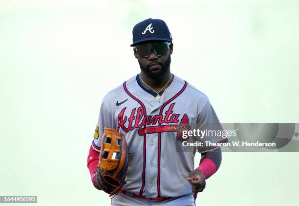Michael Harris II of the Atlanta Braves jogs off the field at the end of the six inning against the San Francisco Giants at Oracle Park on August 27,...
