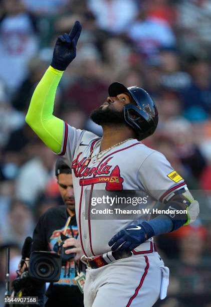 Marcell Ozuna of the Atlanta Braves celebrates after hitting a two-run home run against the San Francisco Giants in the top of the six inning at...