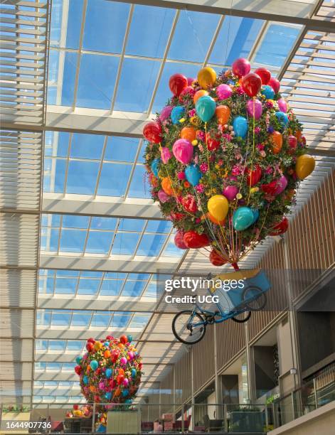 Main atrium and colourful decorations of the Westgate Centre in Oxford, England.
