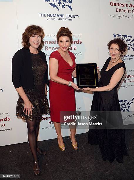 Producer Robbi Peele, TV news reporter Ana Garcia pose backstage with the Outstanding Local TV News award and Senior Director of Hollywood Outreach...