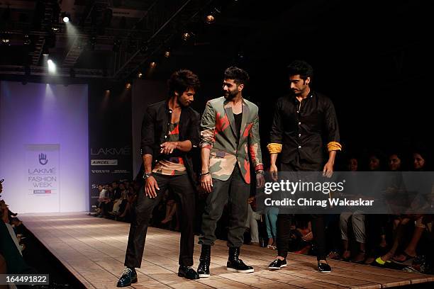 Shahid Kapoor , Kunal Rawal , Arjun Kapoor on the runway during day two of the Lakme Fashion Week Summer/Resort 2013 on March 23, 2013 at Grand Hyatt...