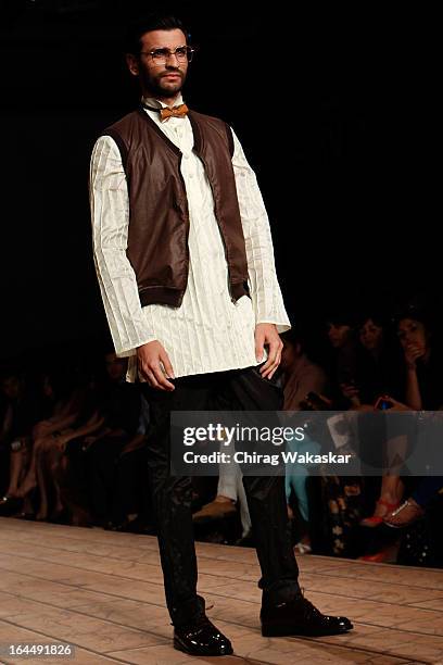 Model showcases designs by Kunal Rawal on the runway during day two of the Lakme Fashion Week Summer/Resort 2013 on March 23, 2013 at Grand Hyatt in...