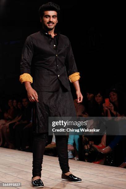 Arjun Kapoor showcases designs by Kunal Rawal on the runway during day two of the Lakme Fashion Week Summer/Resort 2013 on March 23, 2013 at Grand...