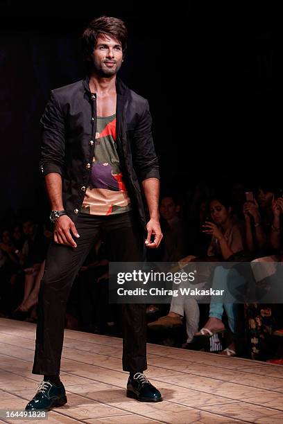 Shahid Kapoor showcases designs by Kunal Rawal on the runway during day two of the Lakme Fashion Week Summer/Resort 2013 on March 23, 2013 at Grand...