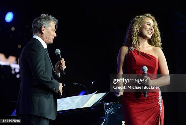 Producer David Foster and singer Haley Reinhart attend Muhammad Ali's Celebrity Fight Night XIX at JW Marriott Desert Ridge Resort & Spa on March 23,...