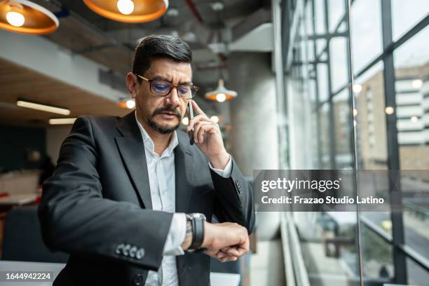 Man Checking 10,355 Checking Time Business Stock Photos, High-Res Pictures, and ...
