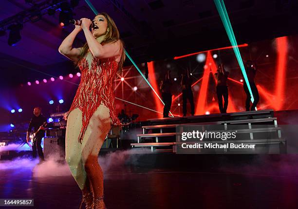 Singer Jennifer Lopez attends Muhammad Ali's Celebrity Fight Night XIX at JW Marriott Desert Ridge Resort & Spa on March 23, 2013 in Phoenix, Arizona.