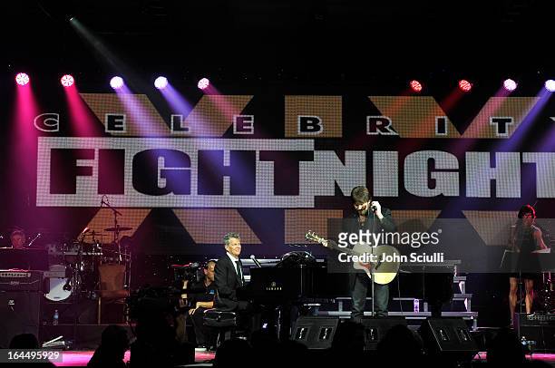 Producer David Foster and singer Billy Ray Cyrus attend Muhammad Ali's Celebrity Fight Night XIX at JW Marriott Desert Ridge Resort & Spa on March...