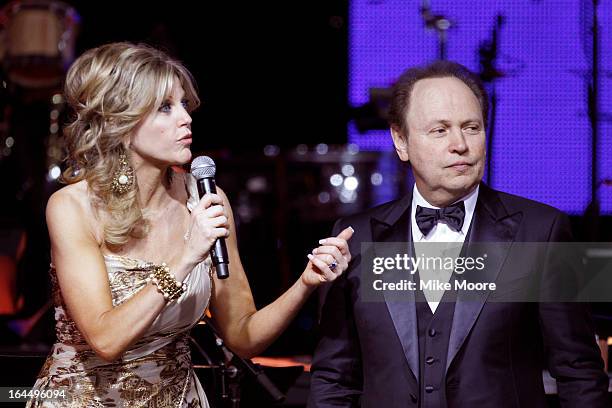 Presenter Tara Hitchcock and Billy Crystal attend Muhammad Ali's Celebrity Fight Night XIX at JW Marriott Desert Ridge Resort & Spa on March 23, 2013...