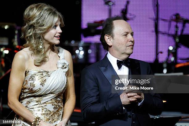 Presenter Tara Hitchcock and Billy Crystal attend Muhammad Ali's Celebrity Fight Night XIX at JW Marriott Desert Ridge Resort & Spa on March 23, 2013...