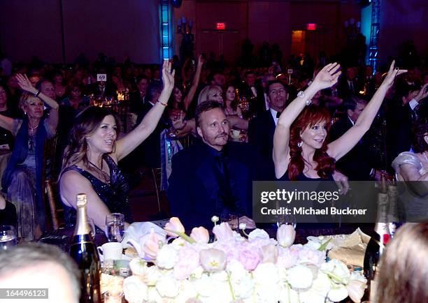 Actress Rita Wilson, Narvel Blackstock and singer Reba McEntire with Moet & Chandon at Celebrity Fight Night XIX at JW Marriott Desert Ridge Resort &...