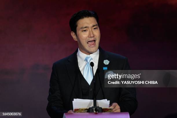 Choi Si-won, South Korean singer, actor and UNICEF East Asia and Pacific Regional Ambassador, delivers his speech during the ASEAN Business and...